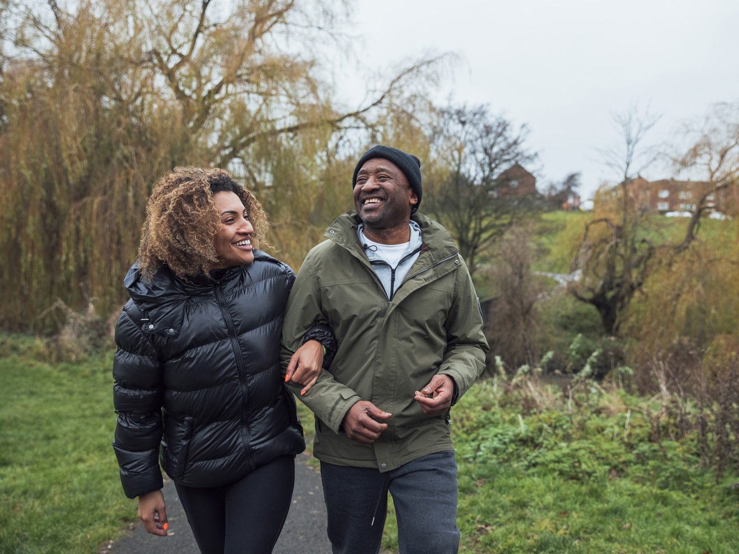 Couple walking and laughing